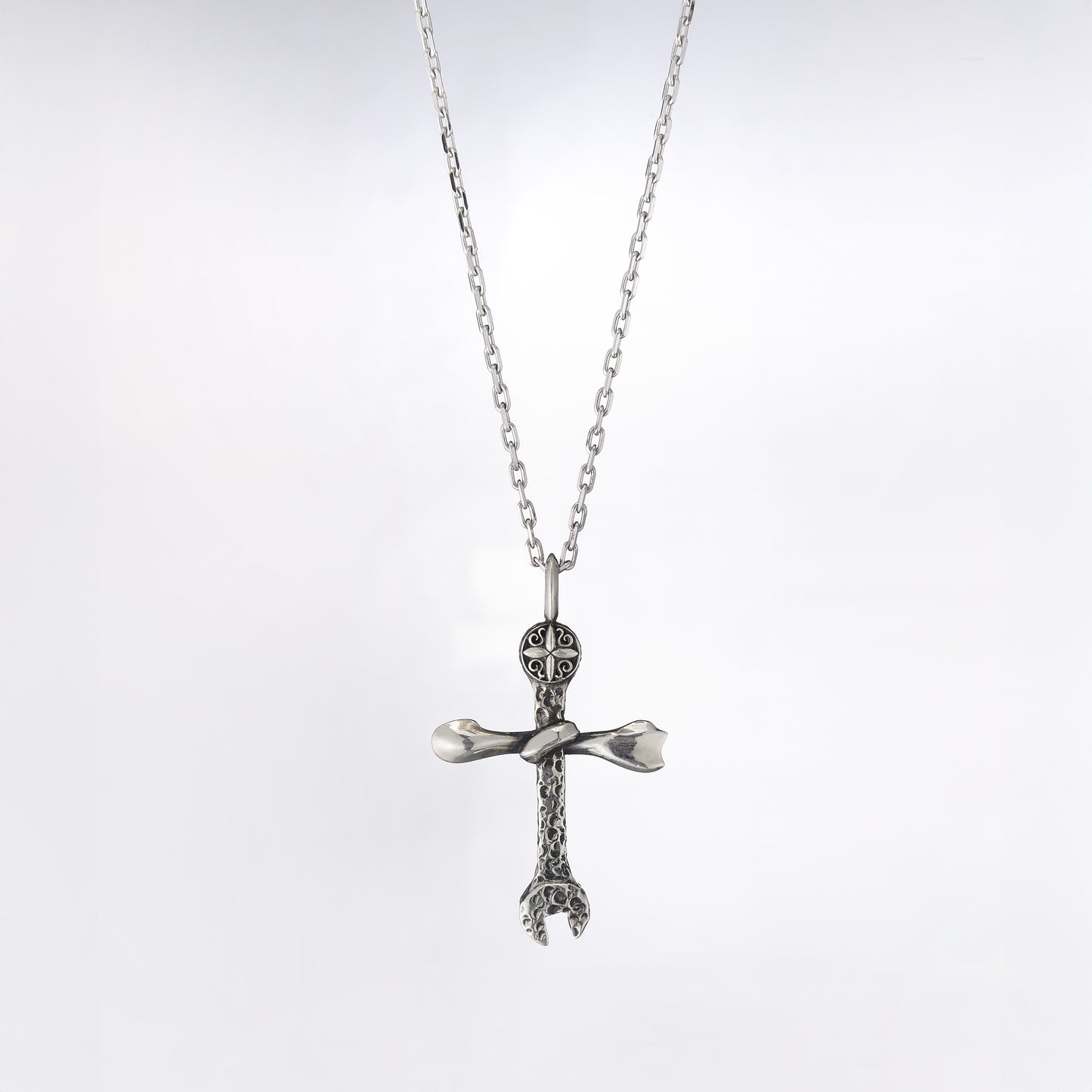 OSK Sterling Silver Wrench & Bone Cross Pendant